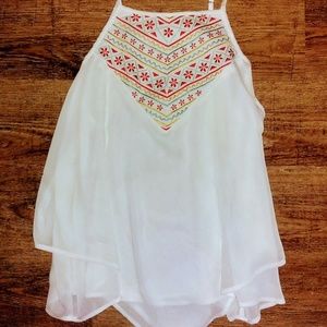 White tank with earrings